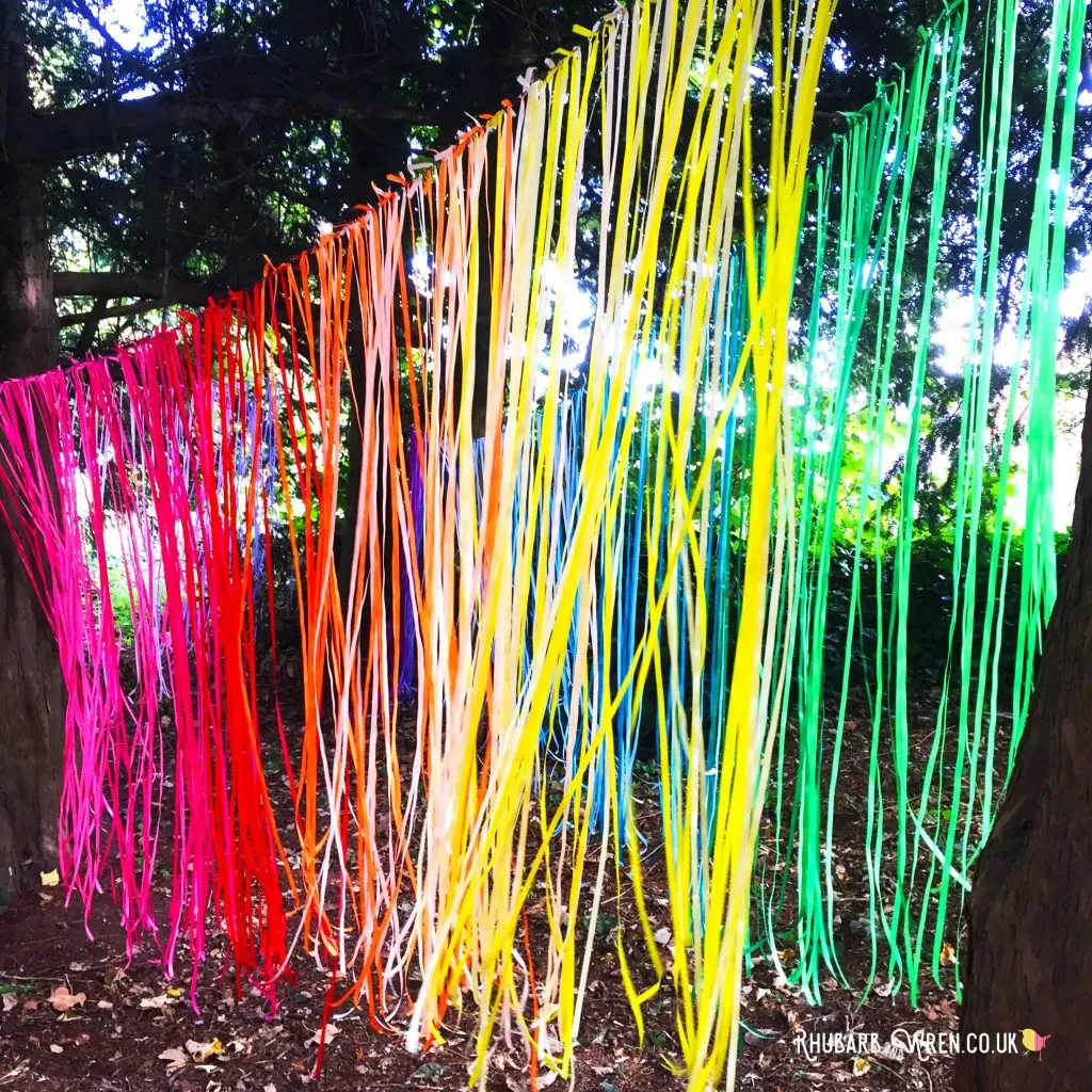 Seaweed Curtain made out of streamers. Just pinch the sides together and  tape on ribbon.